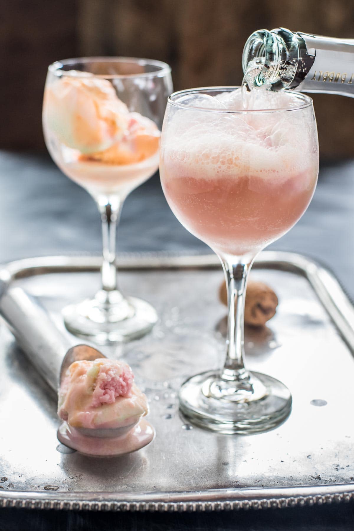 These Pink Champagne Floats with rainbow sherbet are the perfect dessert for Valentine's Day, Mother's Day, or bridal showers.