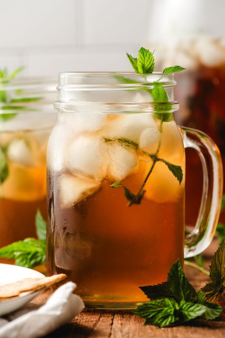 Mint Iced tea served in a glass mason jar, with a mint sprig garnish.