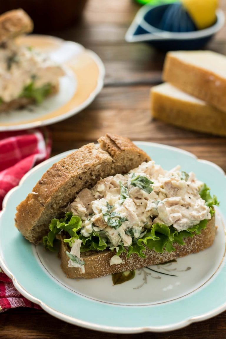 Bursting with fresh basil, lemon juice, and Parmesan cheese, these Basil Chicken Salad Sandwiches taste like summer.