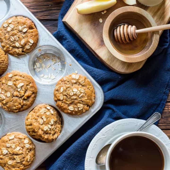 These Apple Oatmeal Muffins are lightly sweetened with honey and spiced with cinnamon for a hearty, healthy breakfast!