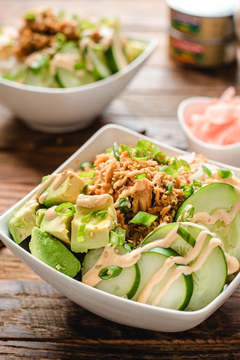 Tuna sushi bowl with avocado, cucumbers, and spicy mayo.