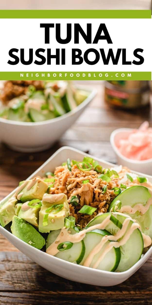 Sushi rice bowl topped with tuna, cucumber, avocado, and spicy mayo drizzle.