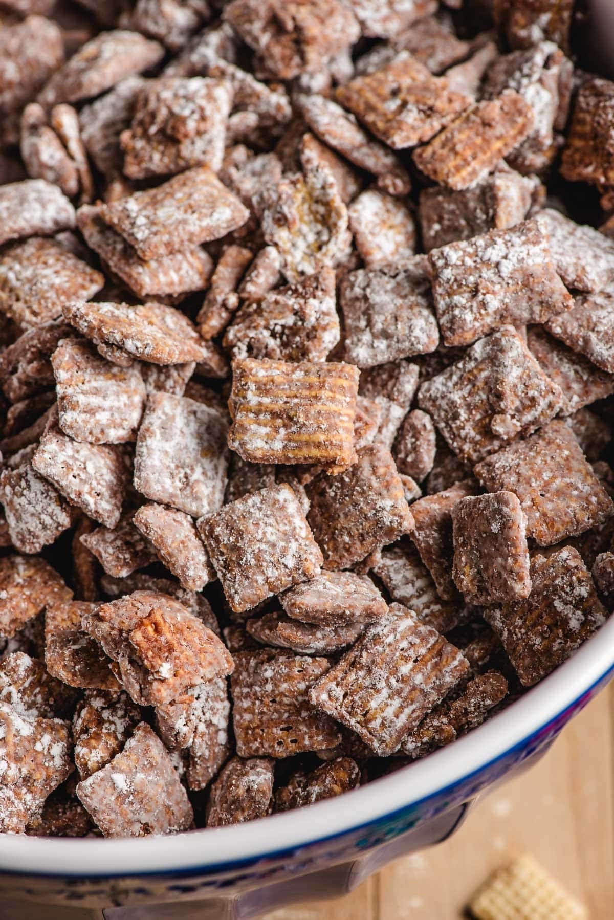Peanut butter puppy chow in a bowl.
