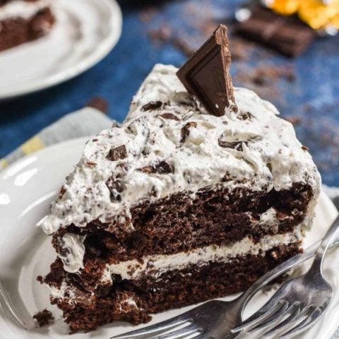 This Chocolate Candy Bar Cake is the perfect way to use up leftover Halloween candy. Use your favorite bars for the ultimate dessert!