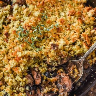 Baked Mushrooms soaked in red wine and butter and covered in parmesan bread crumbs--the ultimate mushroom lovers side dish!