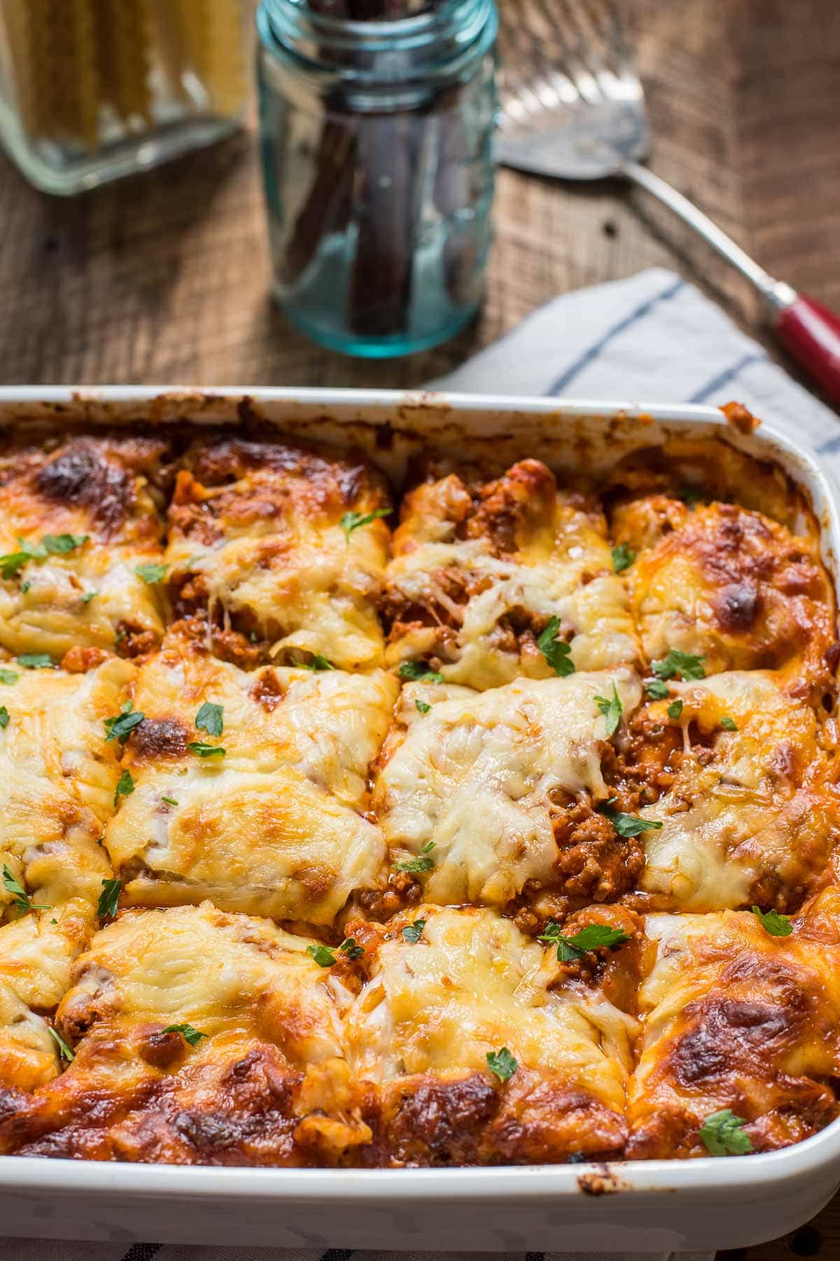 This Cottage Cheese Lasagna is simply THE BEST! Loaded with Italian sausage, ground beef, tomato sauce, and three kinds of cheeses, everyone will love this lasagna!