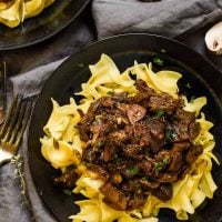 Serve this Red Wine Pot Roast with Mushrooms over egg noodles for a super comforting, hearty weeknight meal.