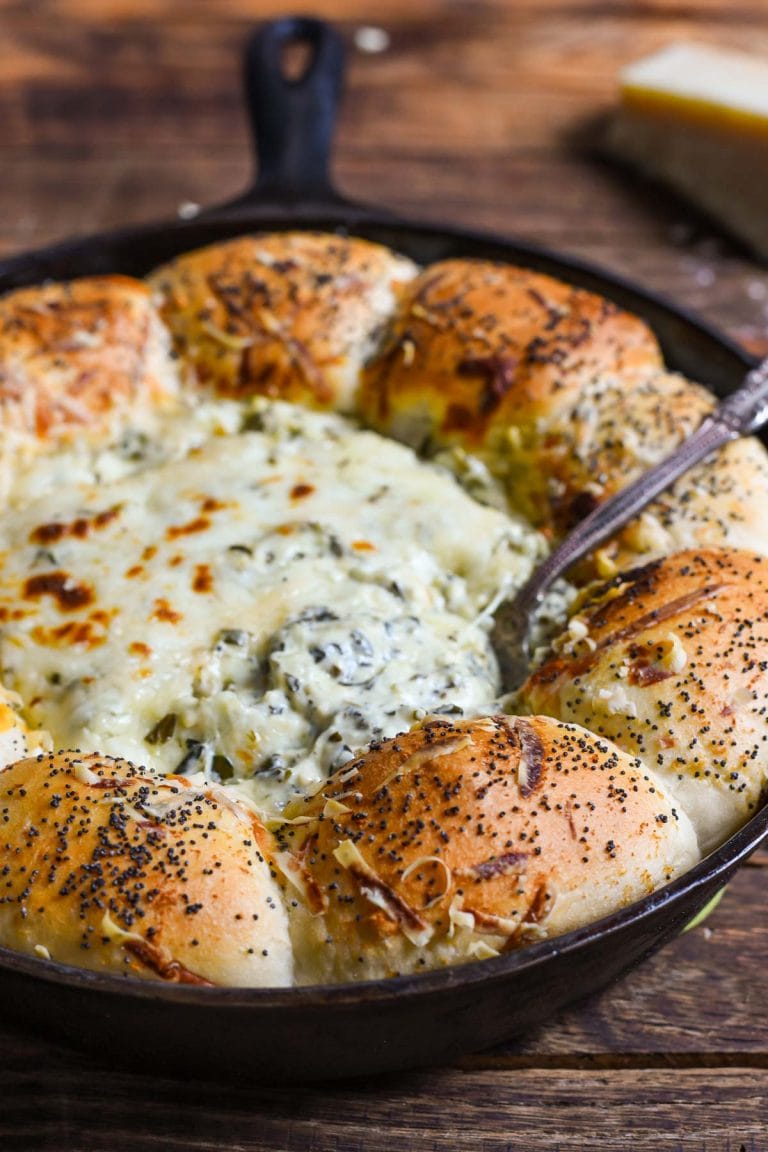 You can throw together this Skillet Bread and Spinach Artichoke Dip in only 15 minutes. This appetizer is a huge hit at parties!