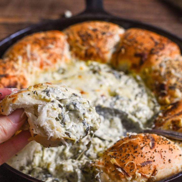 Easy, cheesy, irresistible Skillet Bread and Spinach Artichoke Dip. This appetizer is so good and only required 15 minutes prep!