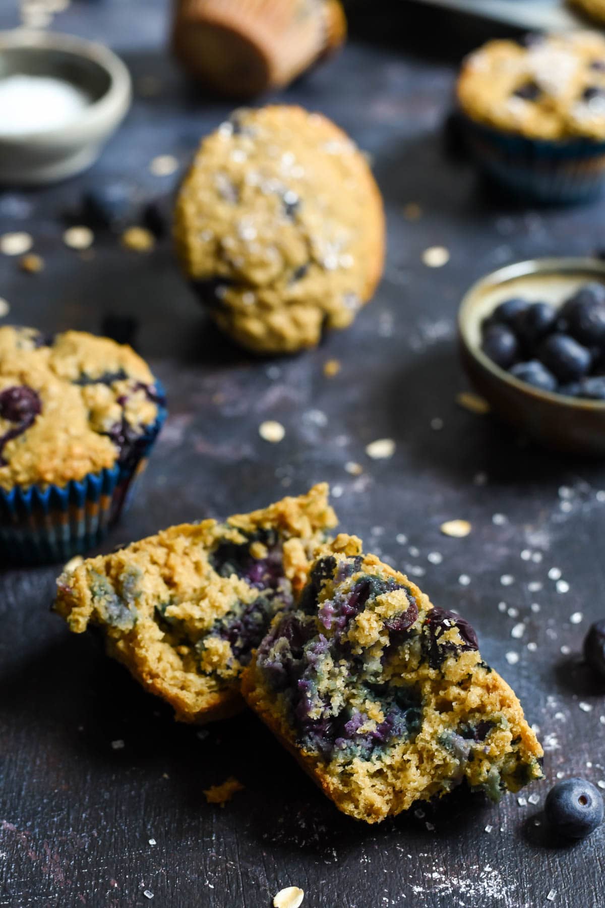These Blueberry Oatmeal Muffins bursting with blueberries and made with Greek yogurt, coconut oil, and oats are a hearty, healthy way to start the day. They freeze great too!