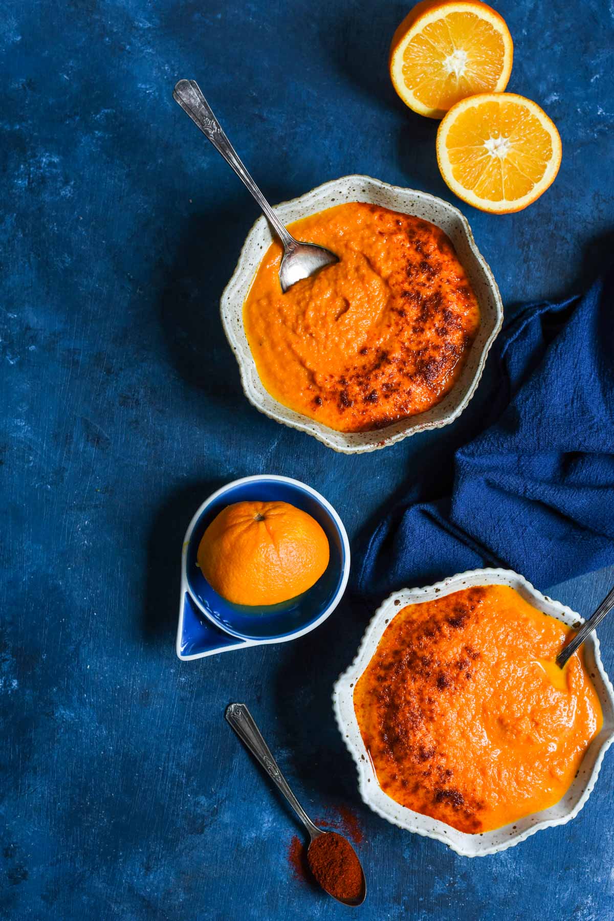 This Creamy Carrot Orange Soup is bright and comforting, with just a little bit of heat. It's my new favorite side dish for a grilled cheese!