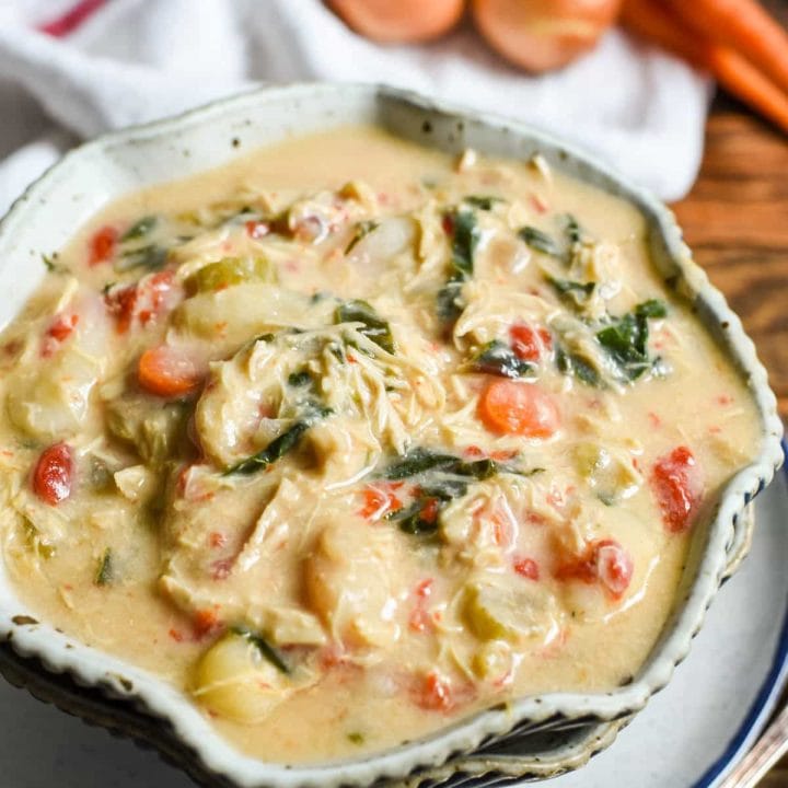 This Crock Pot Chicken Gnocchi Soup is loaded with roasted red peppers, garlic, carrots, and chard in a creamy base.