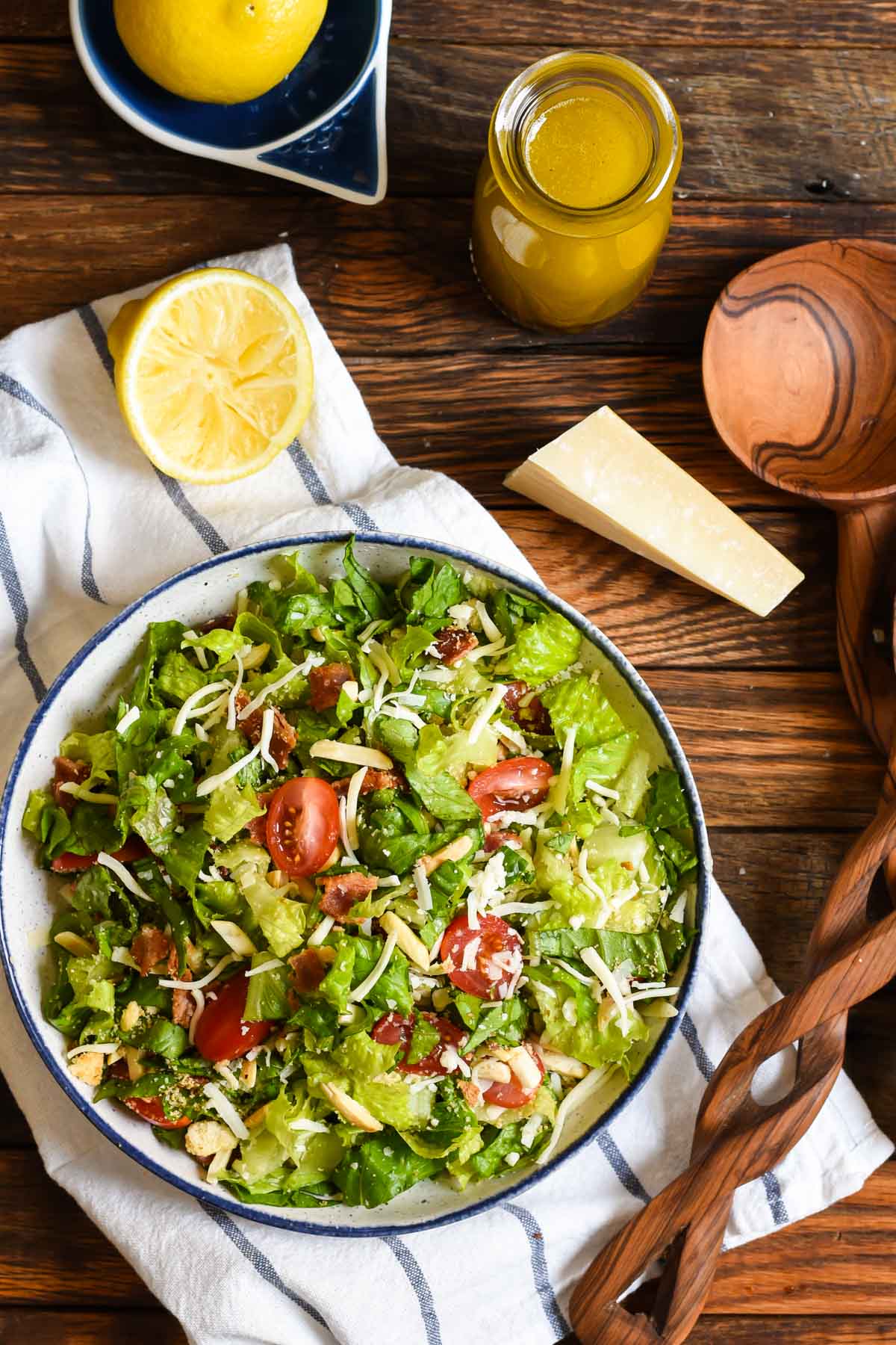 Known only as That GOOD Salad, this bowl has everything you need--crisp lettuce, tomatoes, crispy bacon, two cheeses, and croutons tossed in a simple lemon garlic dressing.