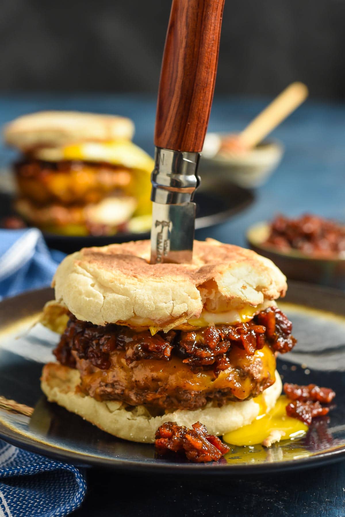 These Breakfast Burgers piled high with Bourbon Bacon Jam, melty cheese, and a fried egg are a breakfast game changer!