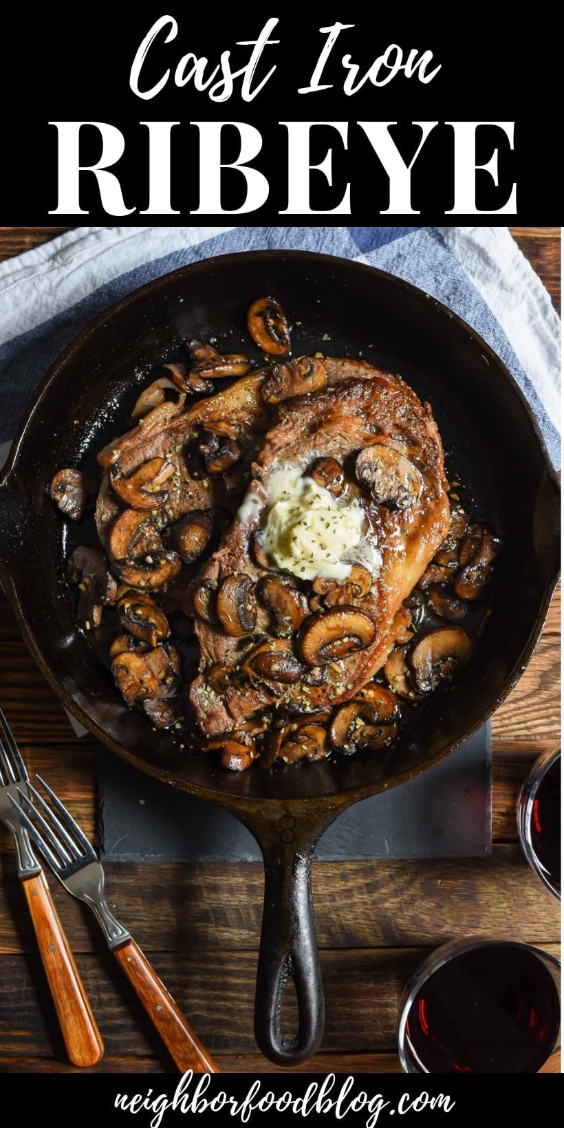 cast iron ribeye steaks in the skillet with mushrooms and melted butter
