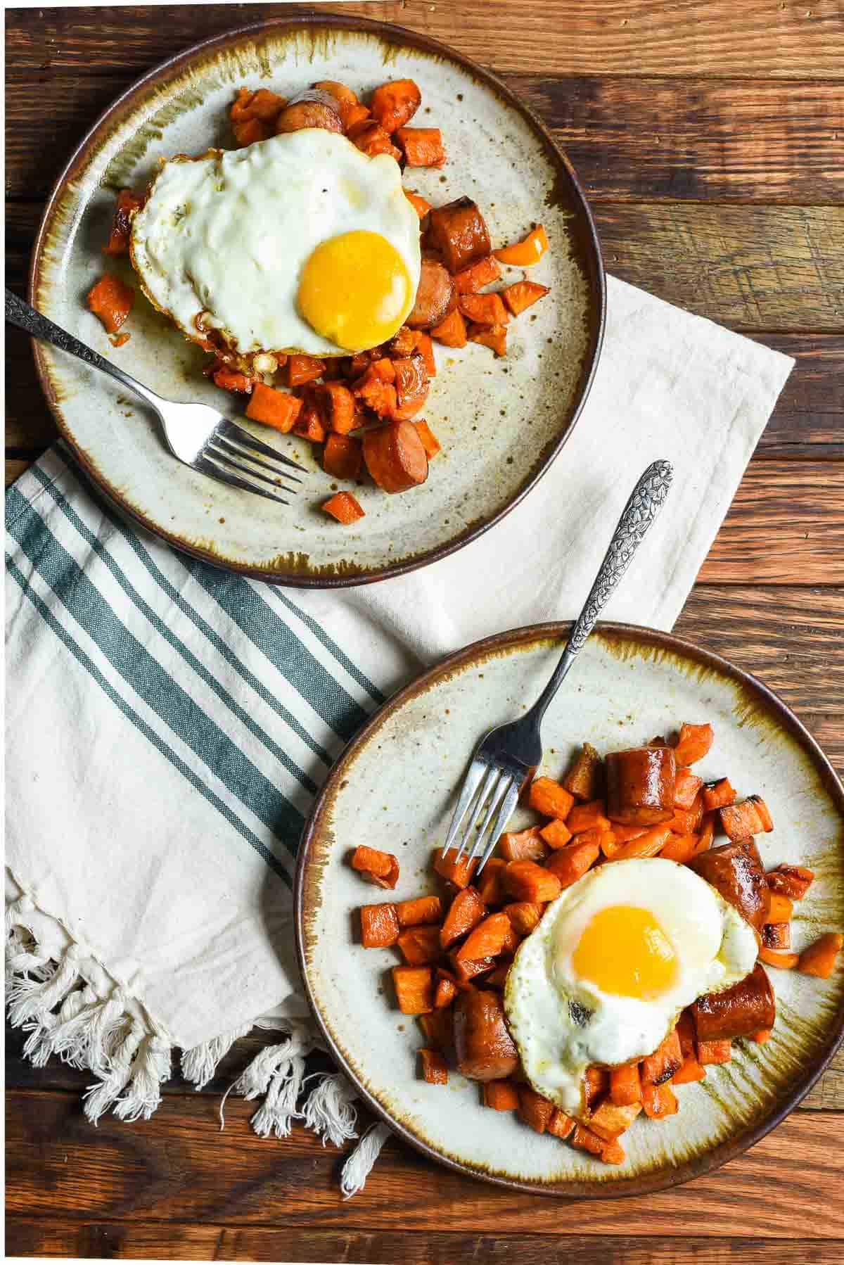 This Maple Roasted Sweet Potato and Chicken Sausage Hash is a great healthy breakfast or easy sheet pan dinner. 