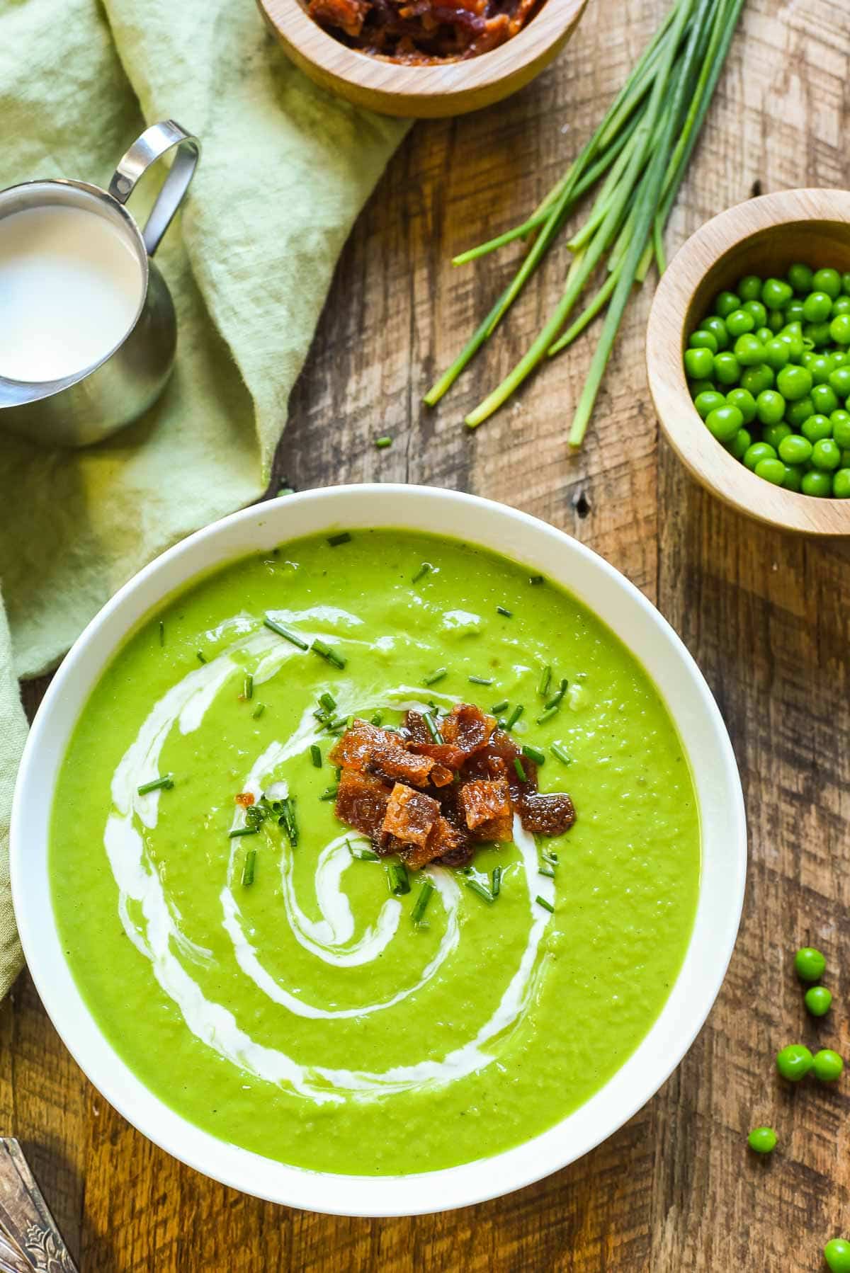 Green Pea Soup with Candied Bacon is a light, creamy soup that absolutely screams spring. It's perfect for Easter or spring brunches!