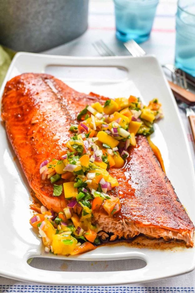 Grilled Salmon with Mango Salsa is a fresh, healthy meal loaded with flavor. This dinner is perfect for summer BBQs!
