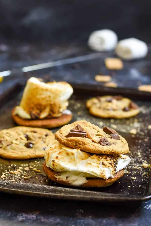 Graham Cracker Chocolate Chip Cookies sandwiched around a toasted marshmallow is all you need for a perfect camping dessert. 