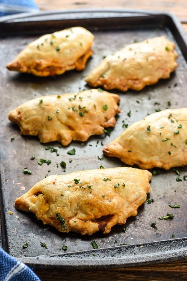 Ground Beef Empanadas surrounded by cheese and wrapped in flaky pie dough are a fun and satisfying dinner or lunch!