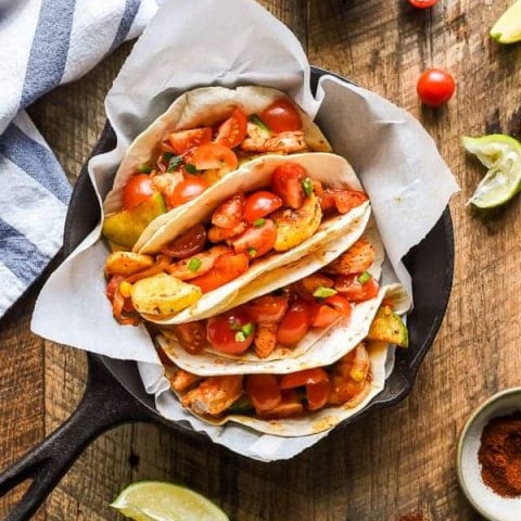These Sheet Pan Shrimp Tacos loaded with summer veggies are a great 30 minute meal.