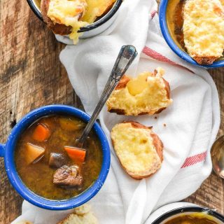 Slow Cooker French Onion Beef Stew combines all the best of french onion soup and beef stew for an amazing, flavorful, hearty stew!