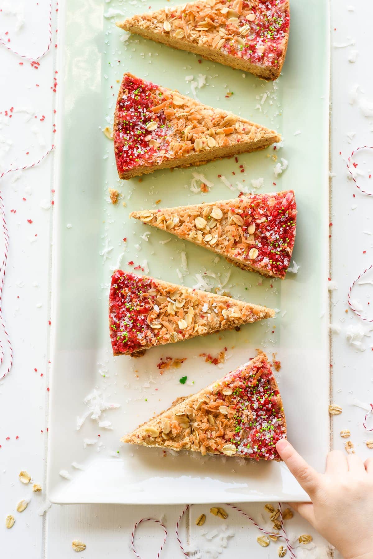 Dress up buttery Coconut Shortbreads with festive colored sugar for a perfect holiday treat!