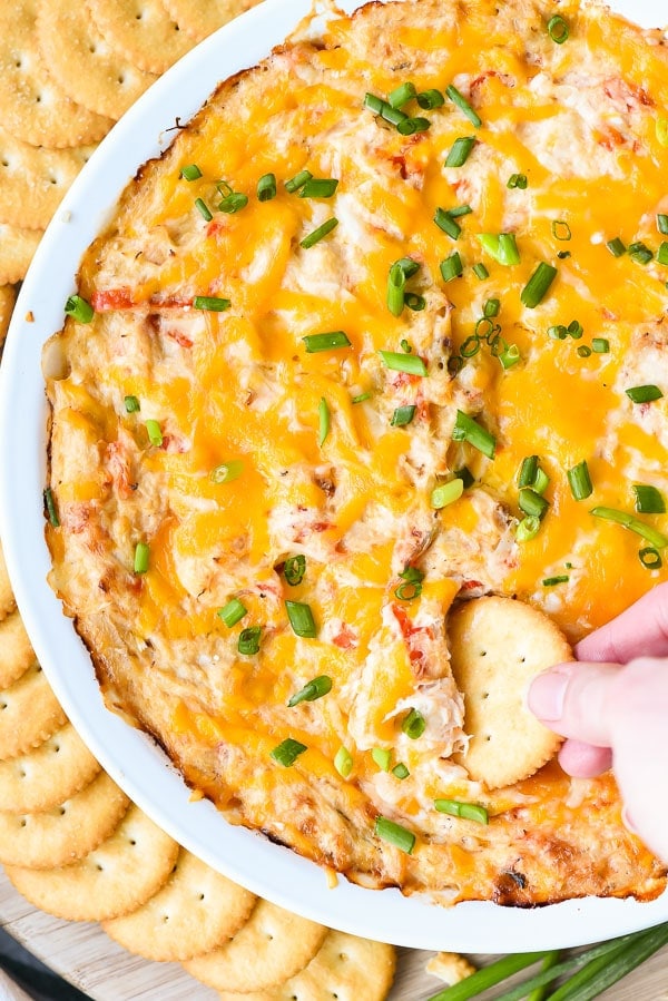 This Hot Crab Dip Recipe loaded with cheese, peppers, and Old Bay Seasoning is always a hit!