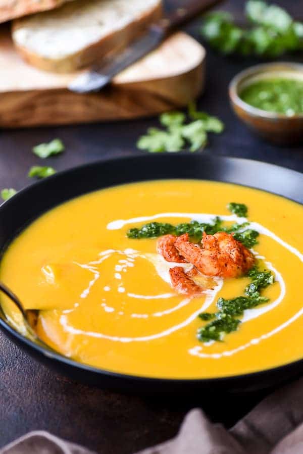 Roasted Butternut Squash Soup in a bowl with a spoon