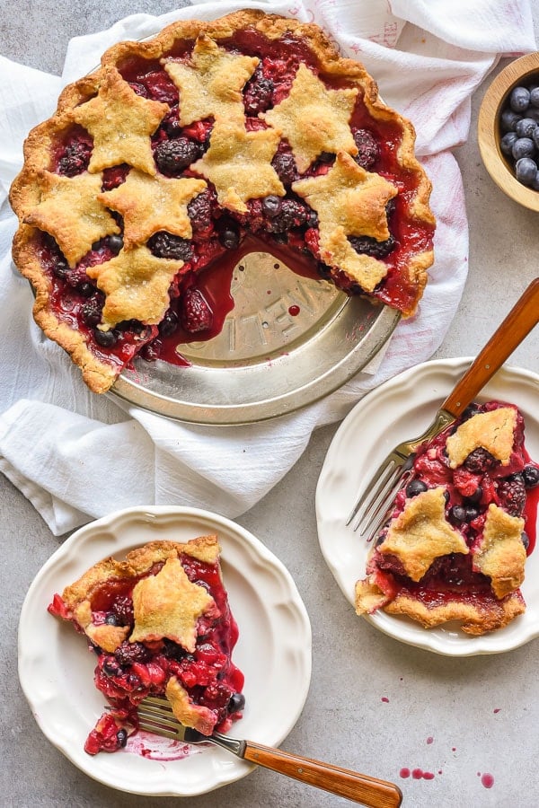 Bumbleberry pie with two slices on plates