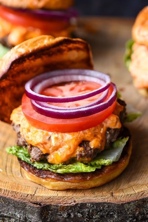 Pimento Cheese Burger with tomato and red onion slices