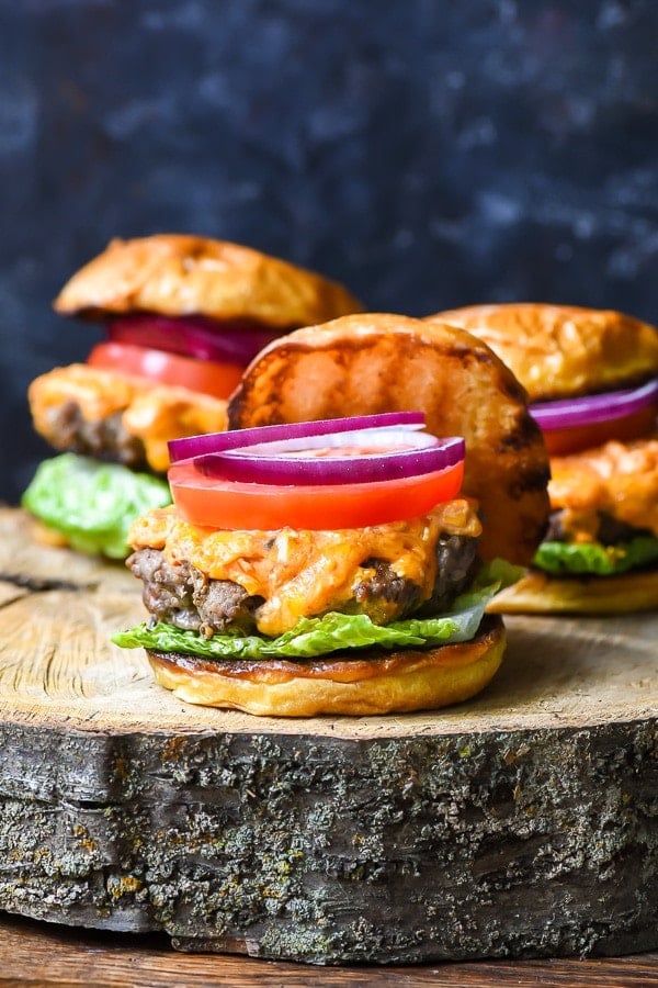 Pimento Cheese Burgers on a wood serving platter