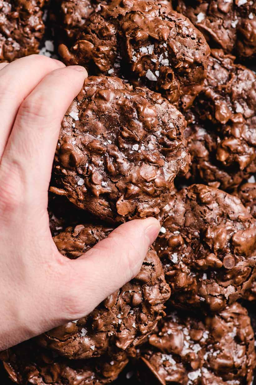 hand reaching for Almond Joy Cookies