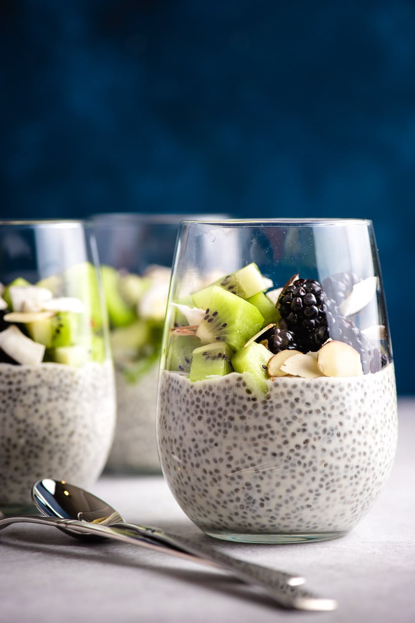 Overnight Chia Pudding topped with blackberries, kiwi, and almonds