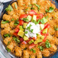 Taco Tater Tot Casserole with avocado and sour cream