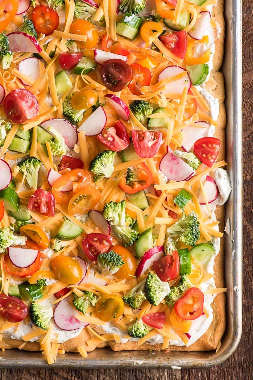 veggie pizza in a large half sheet pan