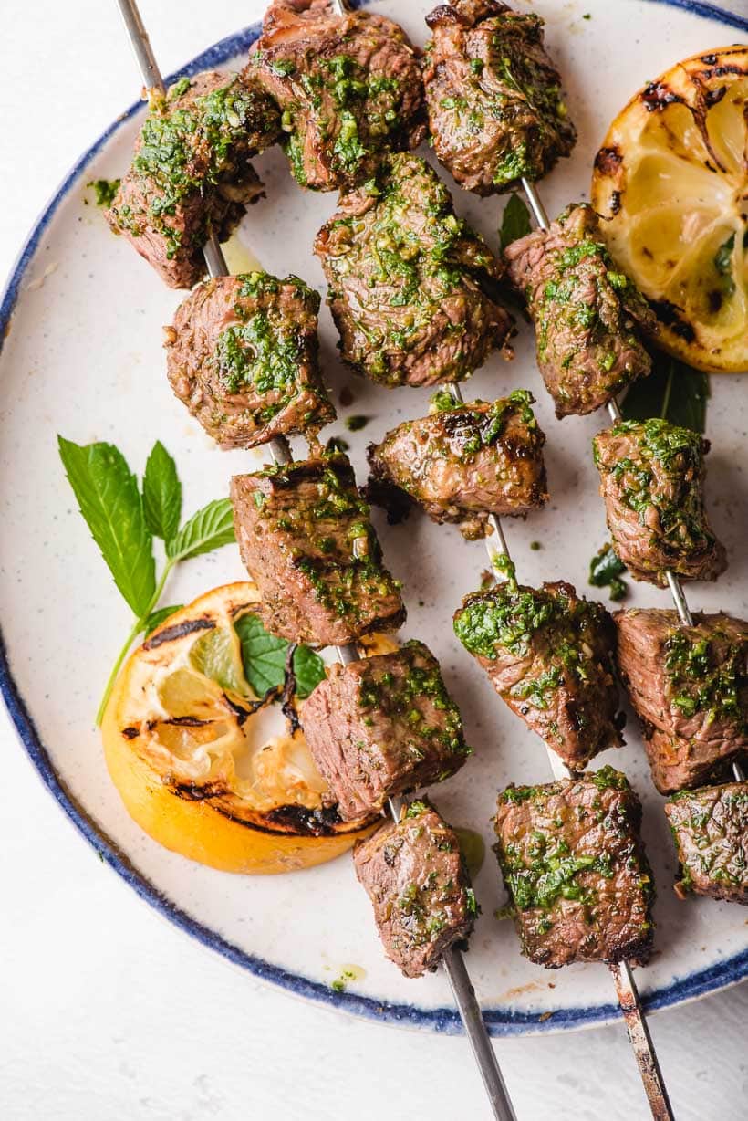 Grilled Steak Kabobs with mint chimichurri brushed on top