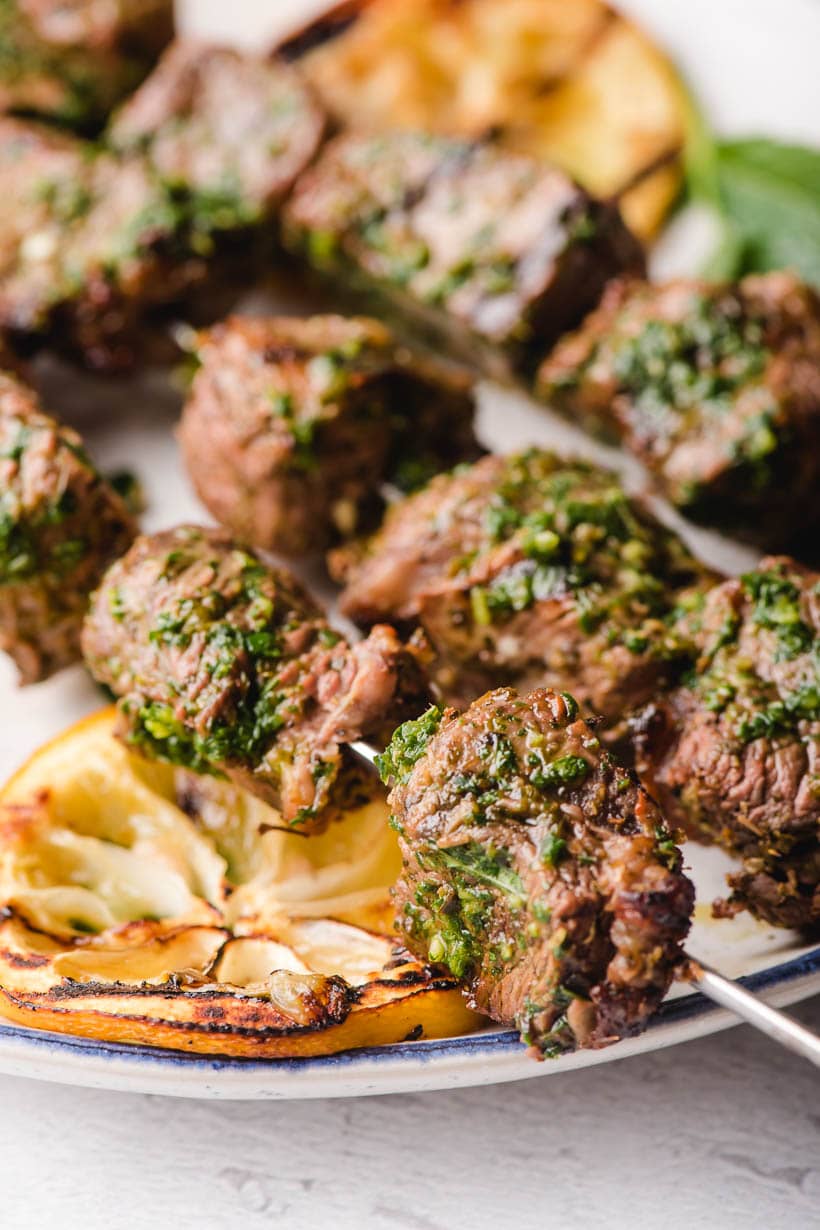 Beef Kabobs with basil mint chimichurri sauce on top