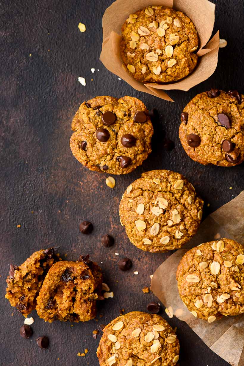 array of pumpkin oatmeal muffins on a black surface