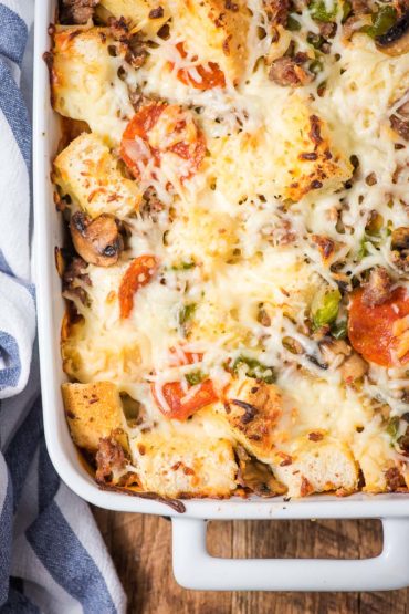 Pepperoni Pizza Casserole baked in a white stoneware dish