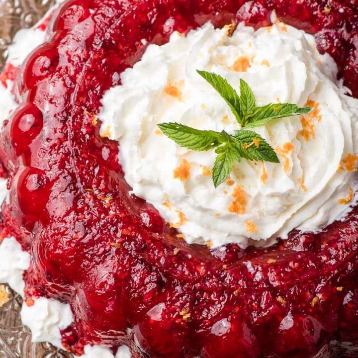 Cranberry Jello Salad with Whipped Cream in the center