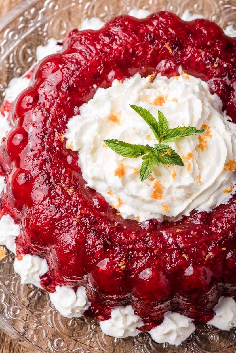 Cranberry Jello Salad with Whipped Cream in the center
