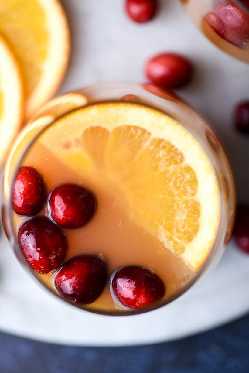 Close up shot of Christmas Punch with floating cranberries and orange slices