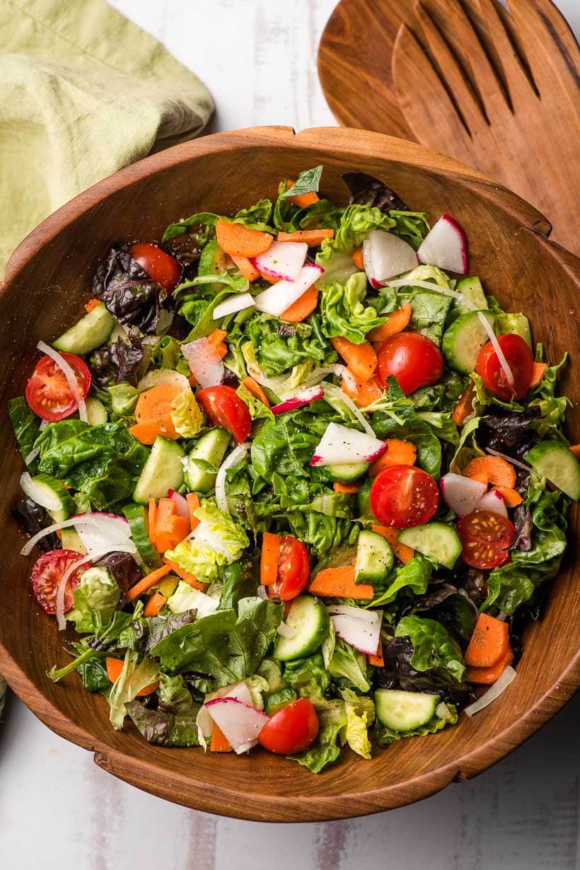 wooden bowl filled with garden salad