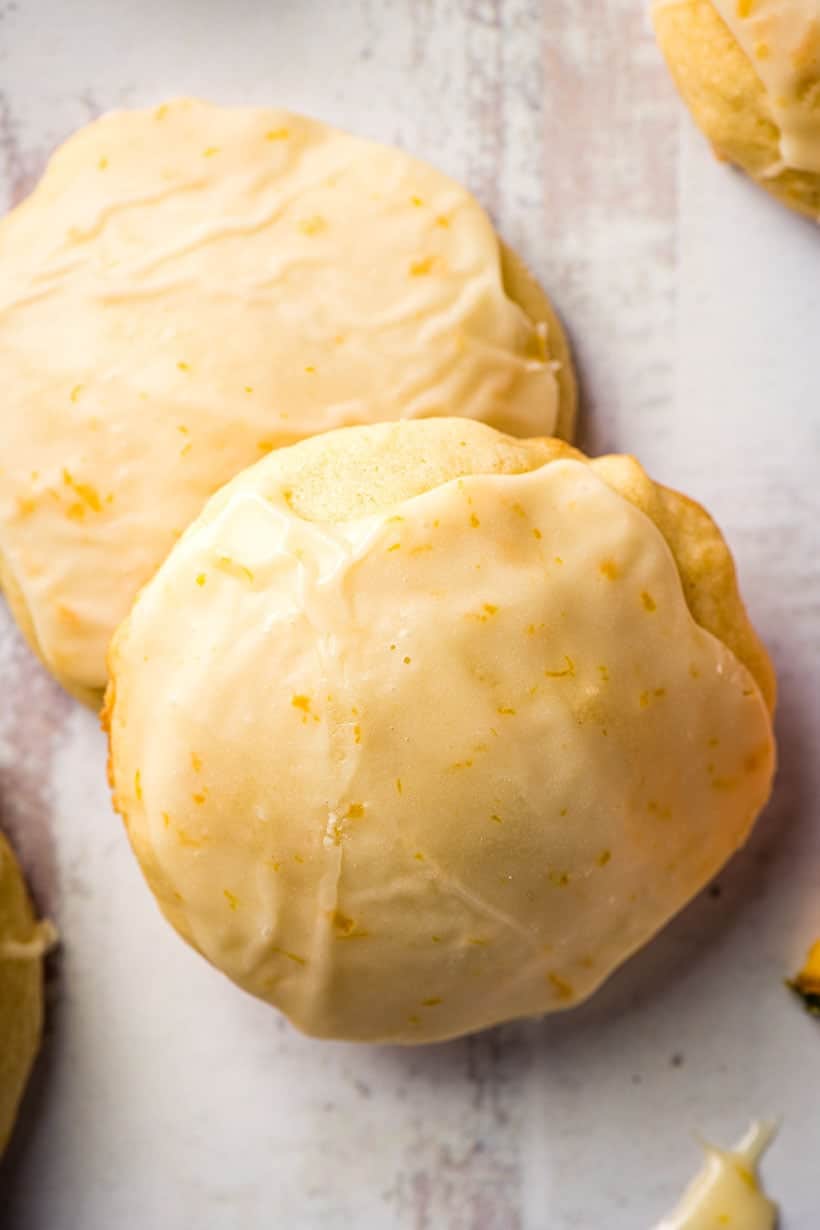 iced orange cookies on a gray background