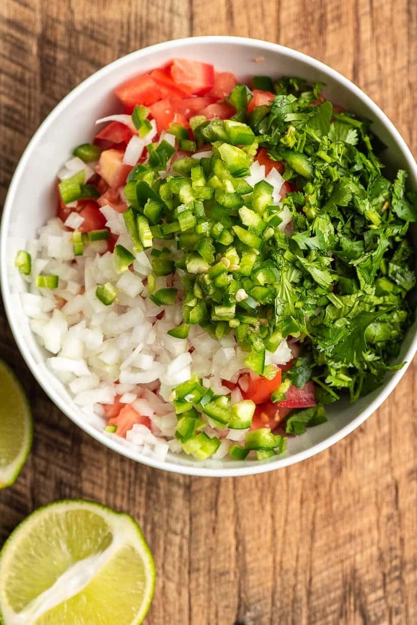 ingredients for pico de gallo in a bowl