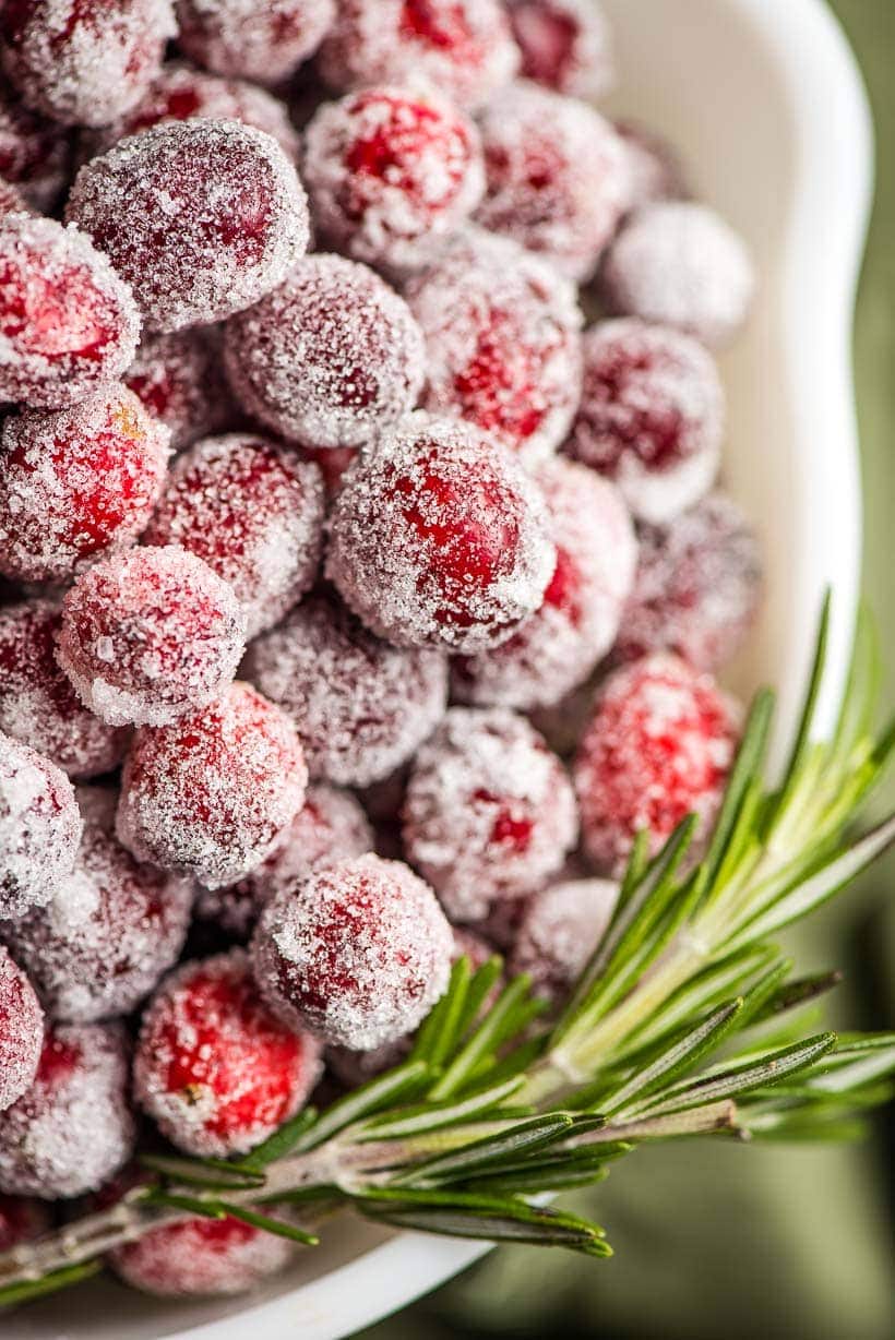 sugar coated cranberries with rosemary sprig
