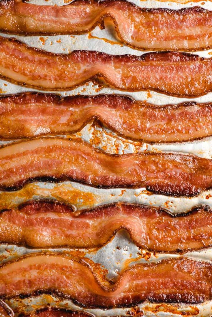 https://neighborfoodblog.com/wp-content/uploads/2021/03/cooking-bacon-in-the-oven-3-735x1101.jpg