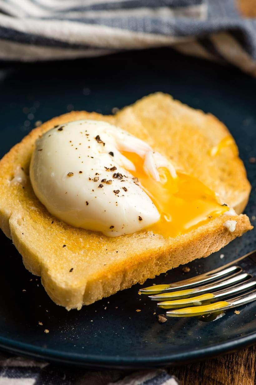 sous vide poached eggs served on toast with perfectly runny yolks