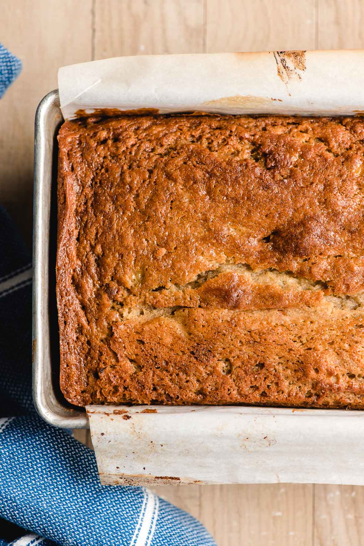 Baked sour cream banana bread in a loaf pan.